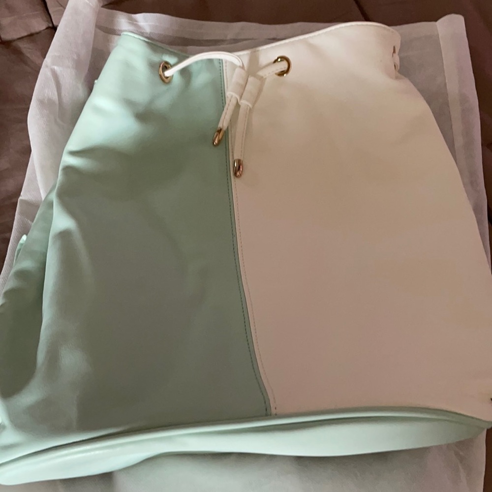 Backpack bag from Neiman Marcus brand. Two tones.